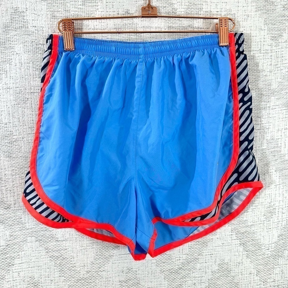 Women's Nike Dri-Fit baby blue running shorts with neon lining size M